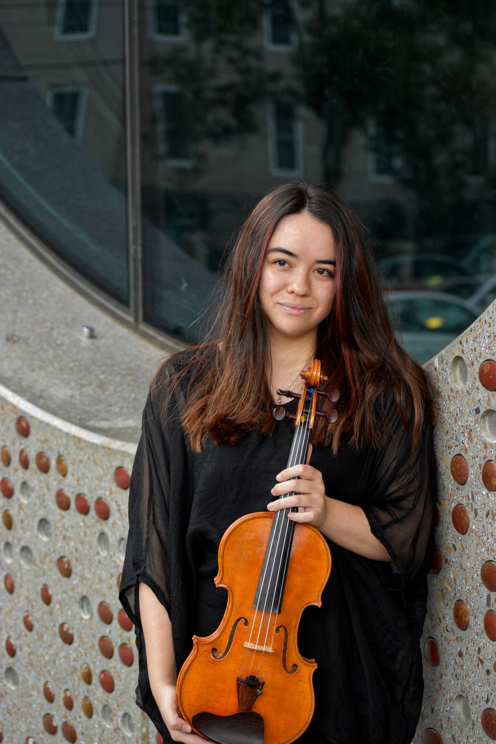 Jody Middleton holding a violin