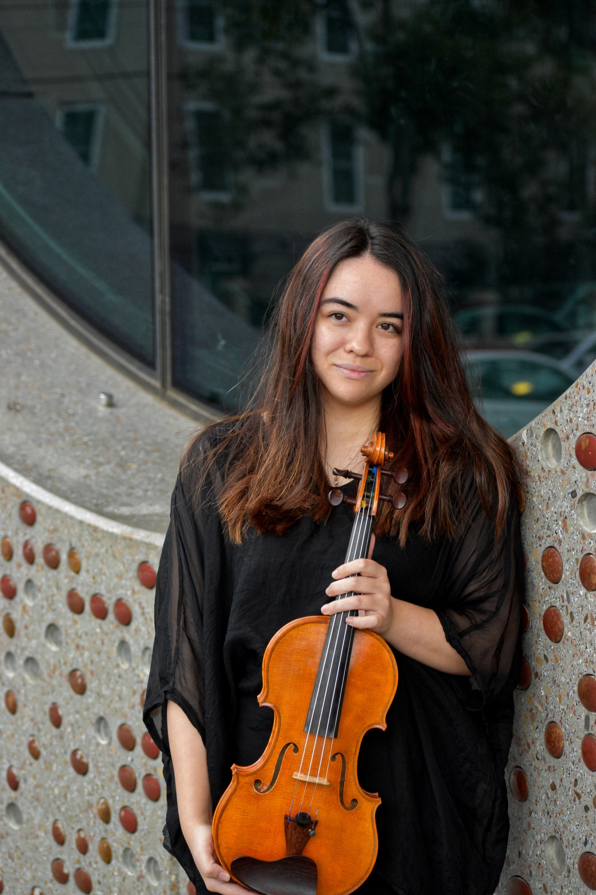 Jody Middleton holding a violin